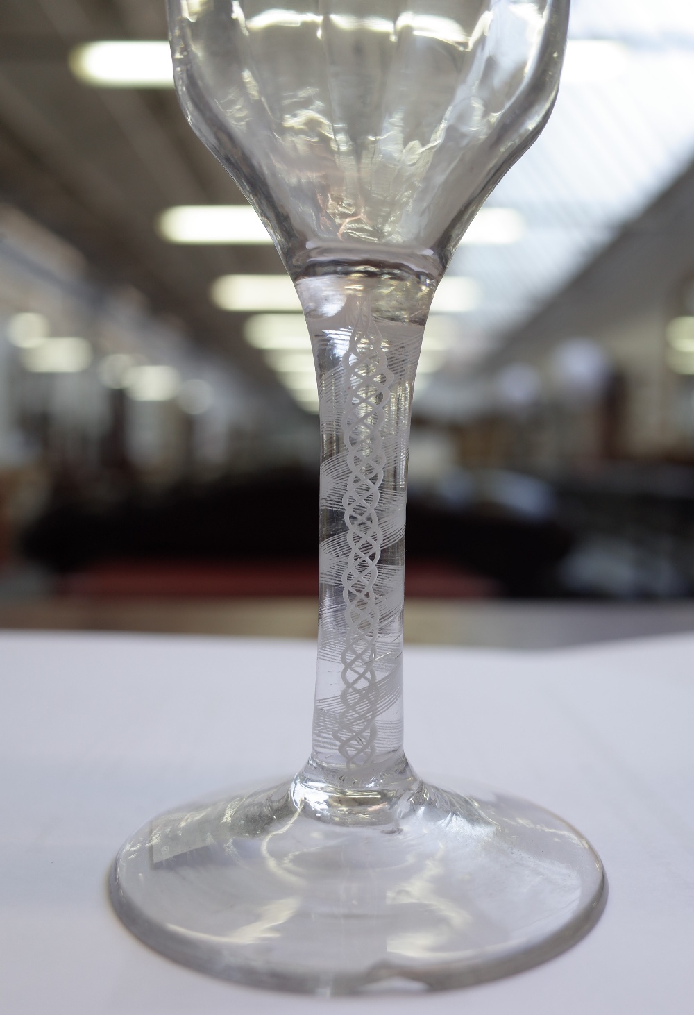 Two opaque twist wine glasses, circa 1765, the taller with moulded ogee bowl, - Image 7 of 7