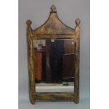 A modern Gothic style gold painted mirror, 61cm wide 119cm high.