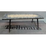 A mid-20th century rectangular mosaic tile top coffee table, on tapering supports,