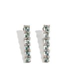 A pair of white gold, treated blue diamond and diamond set earrings,