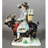 An 18th century Meissen style porcelain figure of a man riding a goat.