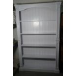 A modern white painted pine floorstanding open bookcase, 120cm wide x 196cm high.