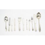 A table service of flatware, decorated in an Art Deco inspired design,