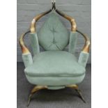 In the manner of Anthony Redmile; a horn framed armchair, 78cm wide x 96cm high.