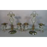 A pair of modern green painted metal two branch candelabra, with glass drop decoration,