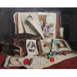 Romek Arpad (1883-1960), A trompe l'oeil still life of books and papers on a table, oil on canvas,