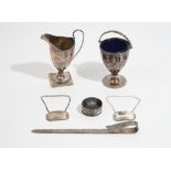 Silver and silver mounted wares, comprising; a ruler, Birmingham 1910, a helmet shaped cream jug,