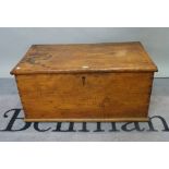 A 19th century elm lift top trunk, 85cm wide x 40cm high.