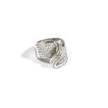A white gold and diamond-set dress ring of cross-over wave scroll design,