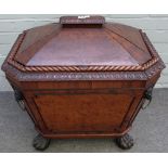 A Regency mahogany canted tapering rectangular wine cooler, with rope twist border and paw feet,