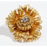 A diamond-set 18ct gold brooch by Grosse of Germany Of abstract flowerhead design,
