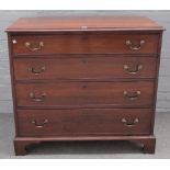 A George III mahogany chest, with four long graduated drawers on bracket feet,