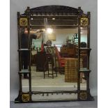 A late Victorian ebonised Aesthetic Movement overmantel wall mirror, 109cm wide x 150cm high.