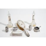 Silver and silver mounted wares, comprising; a pair of scent bottles, a pair of pepperettes,