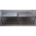 A pair of modern square slate top occasional tables on box metal frames, 88cm wide x 51cm high.