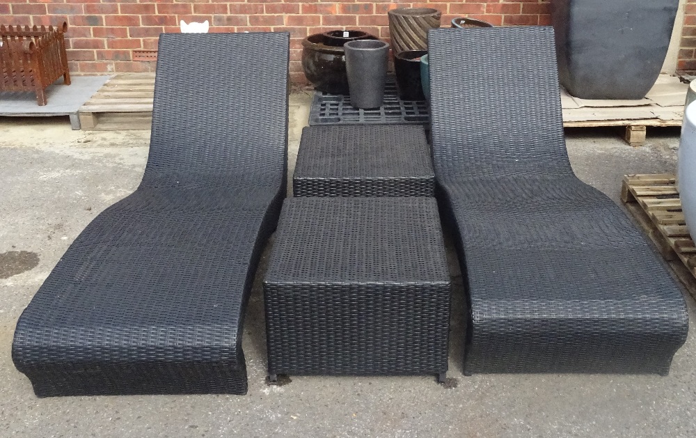 INDIAN OCEAN, a pair of modern faux rattan weave sun loungers and two matching side tables,