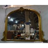 A Victorian style gold painted arch top overmantel wall mirror, 130cm wide x 94cm high,