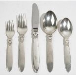 Georg Jensen; Cactus pattern five-piece sterling silver place setting, tablespoon, fork and knife,