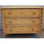 A 19th century French pine three drawer chest of drawers,