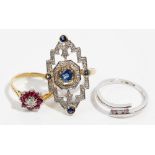A gold and platinum, ruby and diamond set nine stone cluster ring,