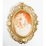 A gold mounted oval shell cameo pendant brooch, carved as a Classical scene with Venus,