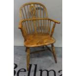 A 19th century ash and elm stickback open armchair, 55cm wide x 89cm high.