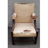 An late 18th/early 19th century Welsh oak framed open armchair on block supports united by