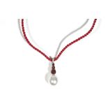 A white gold, garnet, diamond and cultured pearl pendant necklace by Autore,
