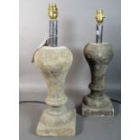 A pair of modern baluster shape reconstituted stone lamps, 47cm high, (2).