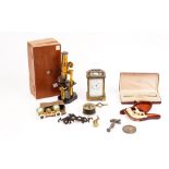 A group of collectables, including a brass students microscope, a Meersham pipe depicting a horse,