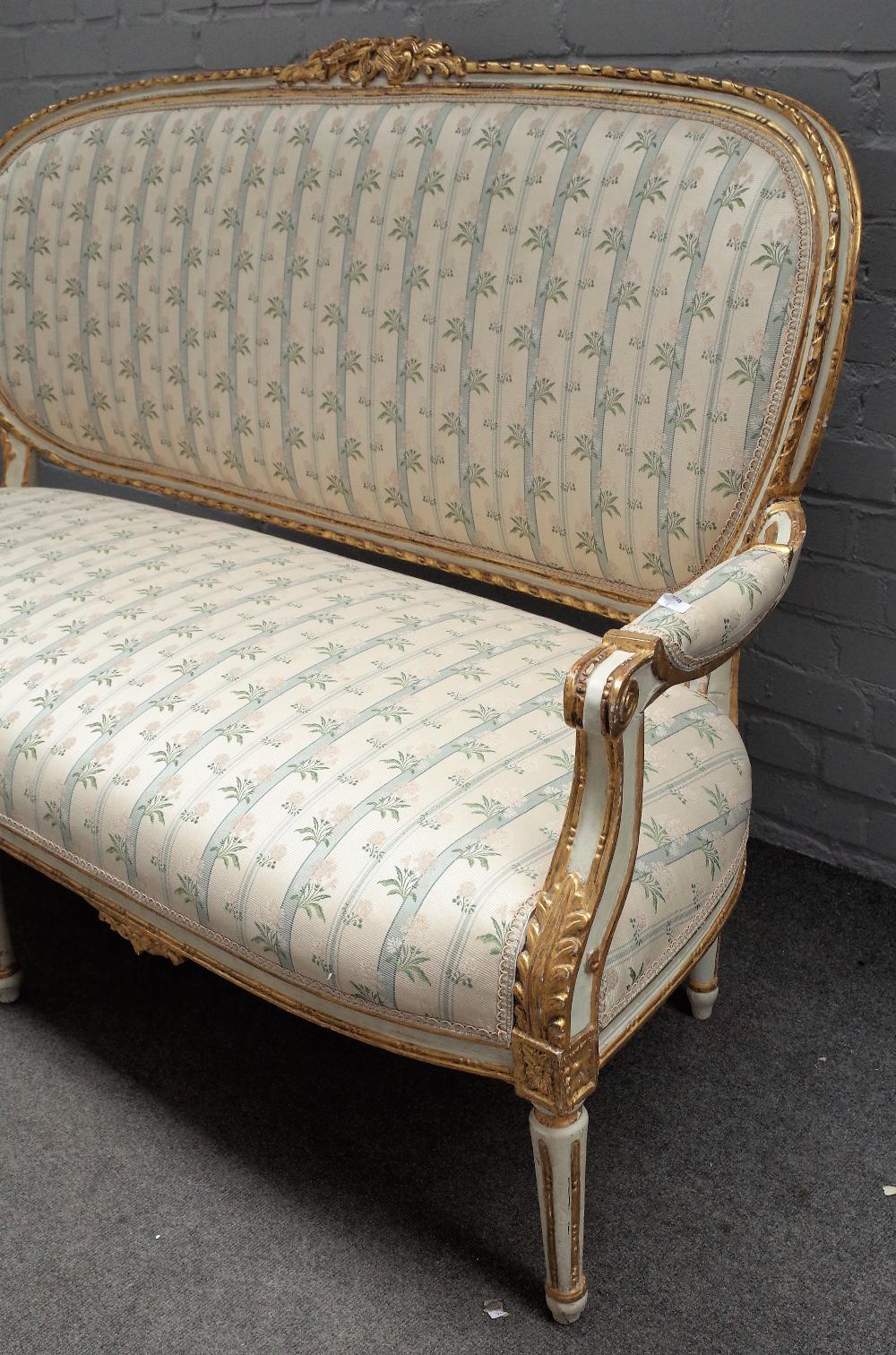 A Louis XVI style painted and gilt framed upholstered settee, 19th century, with ribbon mouldings, - Image 2 of 4