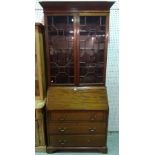 A late Edwardian mahogany bureau bookcase,