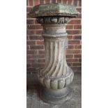 A 19th century terracotta pedestal of fluted baluster form, on stepped circular base, 120cm high.