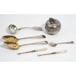A pair of silver and gilt berry spoons, London probably 1809, a fiddle pattern sauce ladle,