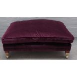 Duresta; a rectangular footstool with loose cushion top,