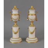 A pair of reproduction Louis XVI style gilt metal mounted white possibly Alabaster cassolettes,