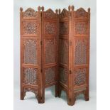 An Indian hardwood four fold screen, 20th century, in 19th century style,