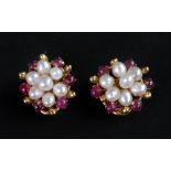 A pair of cultured pearl and ruby caboch