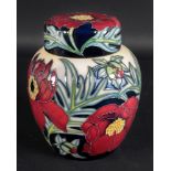 A Moorcroft vase, tube lined with flower