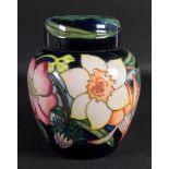 A Moorcroft vase, tube lined with flower