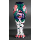 A Moorcroft vase, tube lined with flower