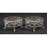 A pair of George III silver oval salt ce