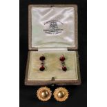 A pair of Victorian 9ct gold almandine garnet closed back pendant earrings on hook fittings,