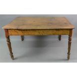 A Victorian waxed pine kitchen table, on