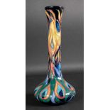 A Moorcroft vase, tube lined with flowers, 2008, no. 249, 21cm high, with associated box (2).