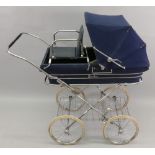 A silver cross pram, with chromium plate