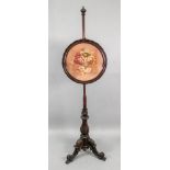 An early Victorian rosewood pole screen
