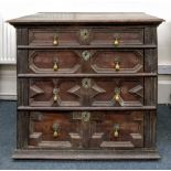 A late 17th century oak chest, of panelled construction,