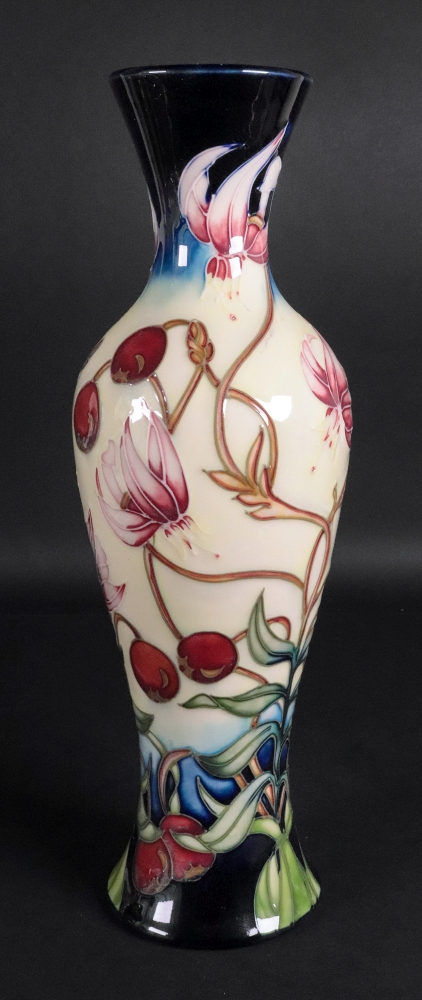 A Moorcroft vase, tube lined with flower