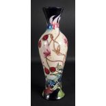 A Moorcroft vase, tube lined with flower